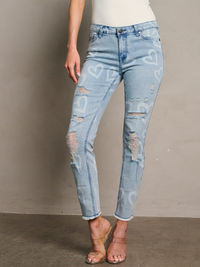 WOMEN'S BUTTON CLOSURE HEART PRINT DISTRESS DENIM SKINNY PANTS